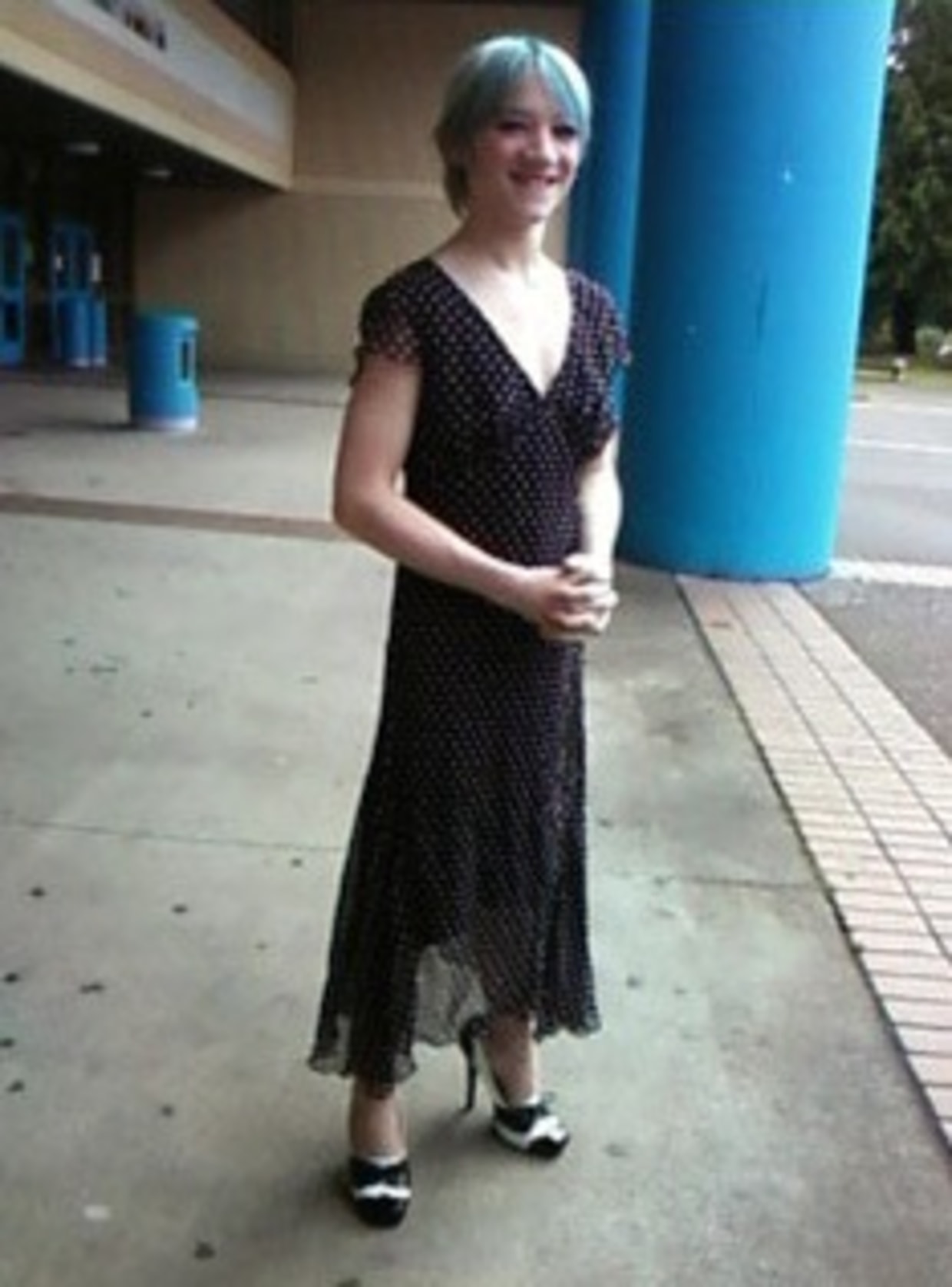Boy wearing a outlet dress and high heels